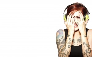 Tatted girl with headphones