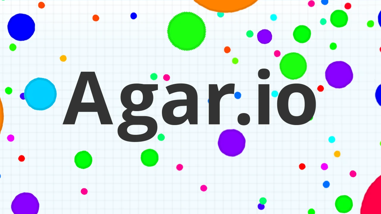 Agar.io multiplayer arena showing colorful growing cells and mass splitting in Chrome