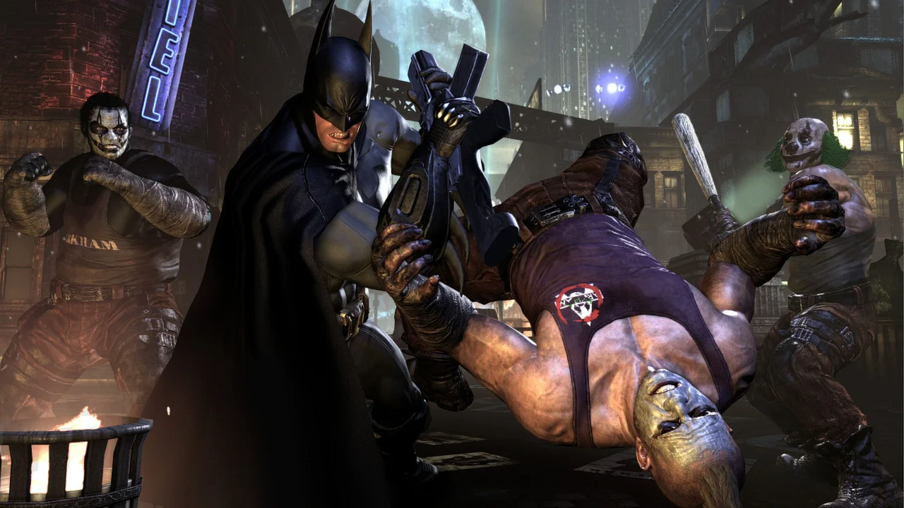 Batman perched atop a stone gargoyle surveying snow-covered rooftops in Arkham City