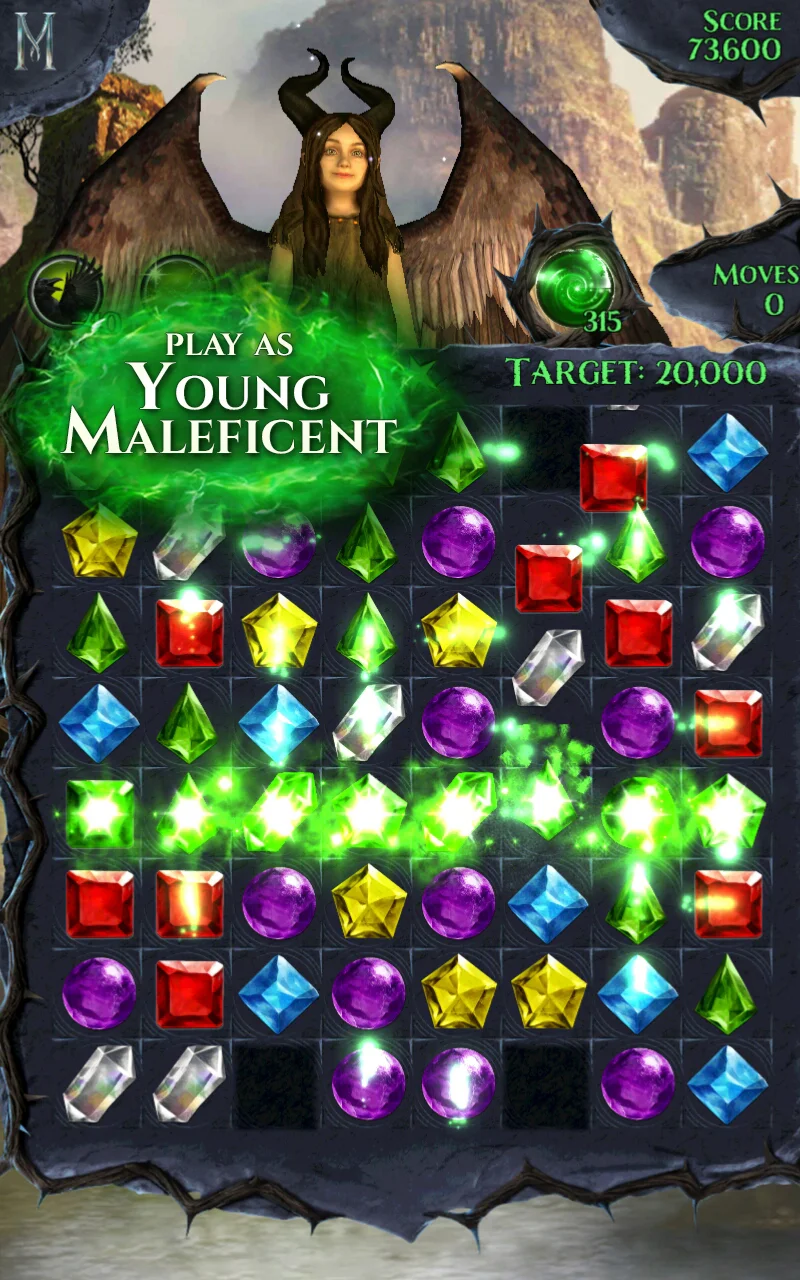 Dark fantasy gemstone match-3 puzzle board with green witchfire in Disney Maleficent Free Fall