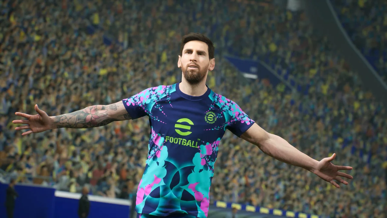 Gameplay screenshot of eFootball showing midfield pass buildup, grass pitch turf, and official club kits