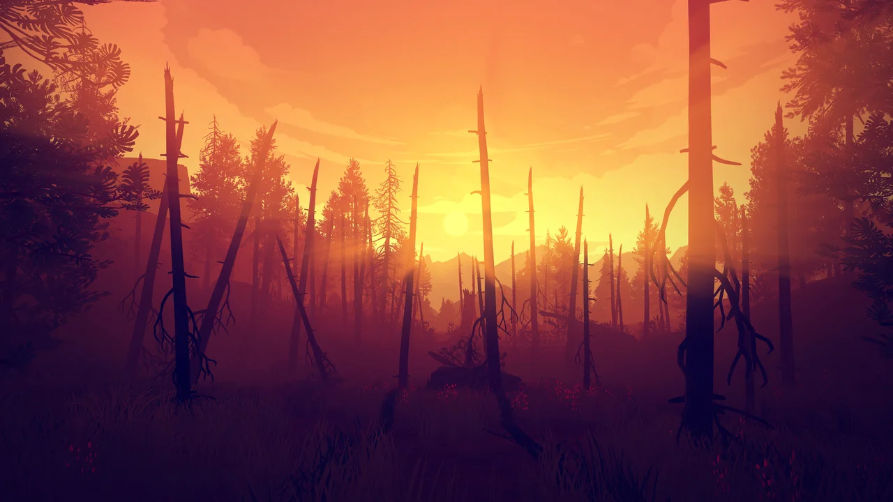 First-person perspective of a Wyoming forest at sunset with orange light shining through silhouetted pine trees