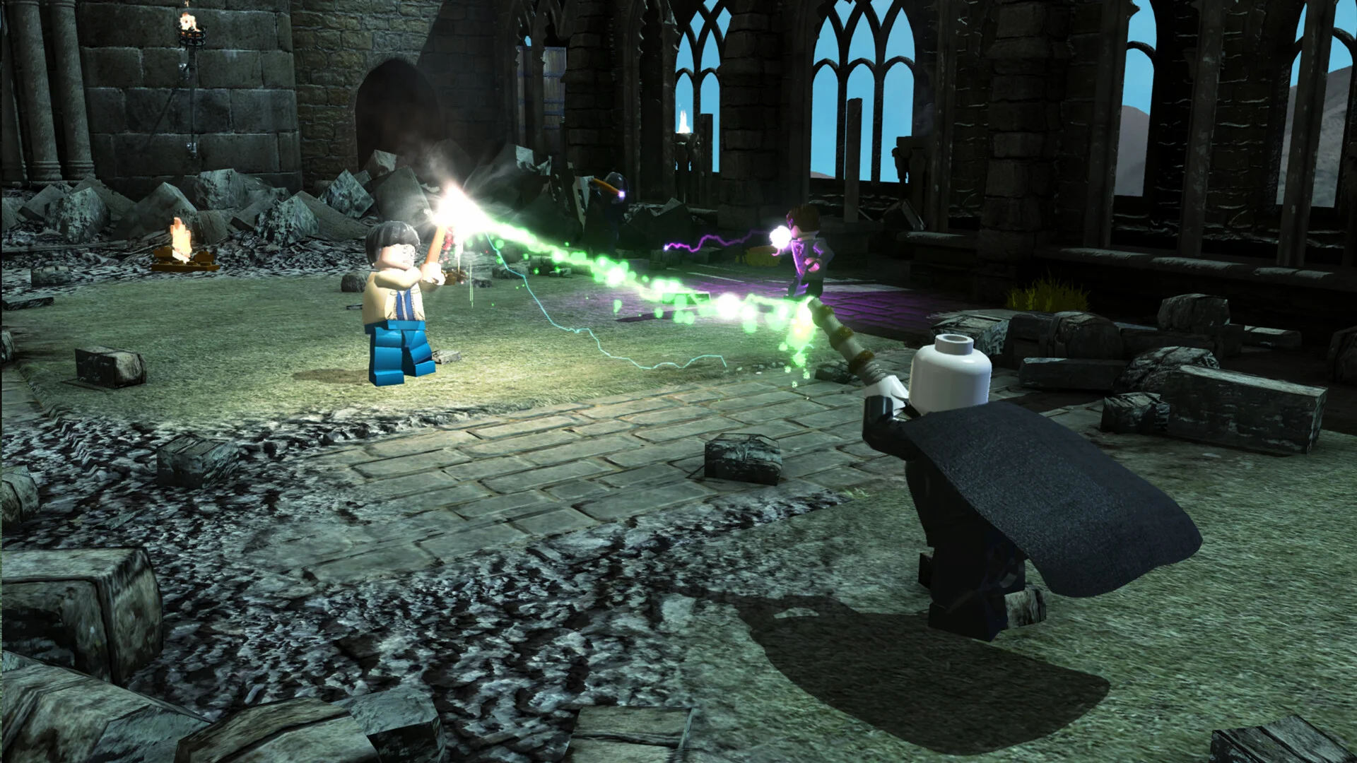 Harry Potter and Hermione Granger casting spells inside the Great Hall in LEGO Harry Potter Collection