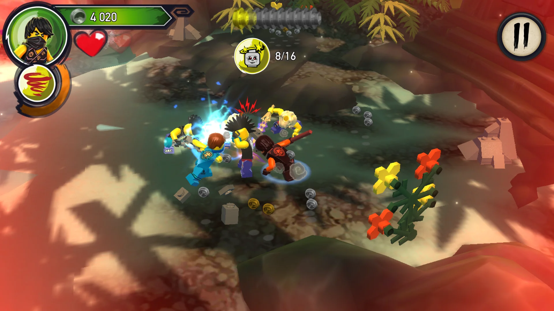 Kai and Lloyd unleashing Spinjitzu elemental attacks against serpentine warriors in LEGO Ninjago: Shadow of Ronin