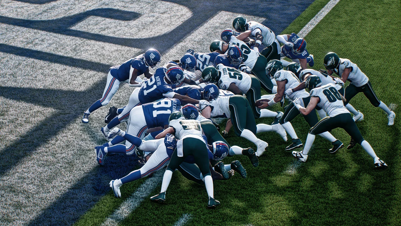 Gameplay screenshot of EA SPORTS Madden NFL 27 showing quarterback pocket dropback and defensive line rush