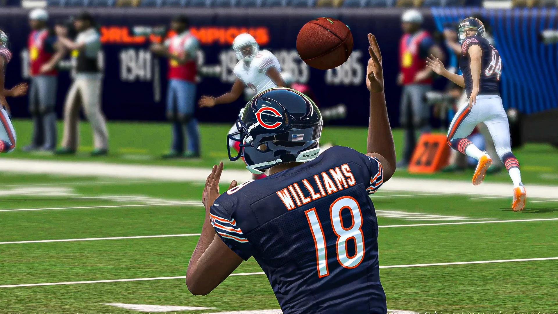 Gameplay screenshot of Madden NFL Mobile Football showing quarterback pass pocket and on-screen touch controls