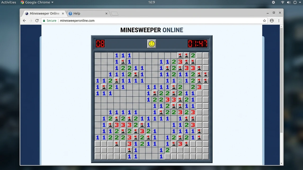 Minesweeper Online numbered grid board and flagged mines interface in Chrome