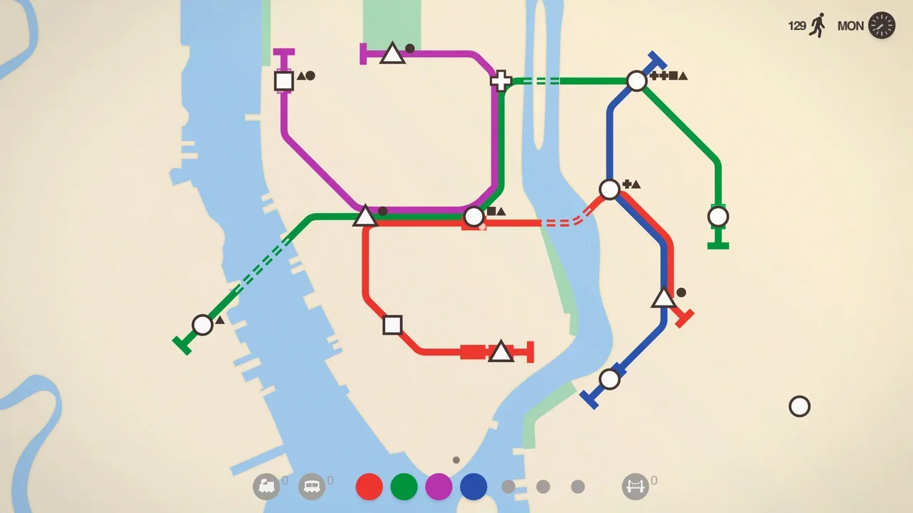 Mini Metro gameplay showing clean subway line schematics connecting circle, triangle, and square stations across a river