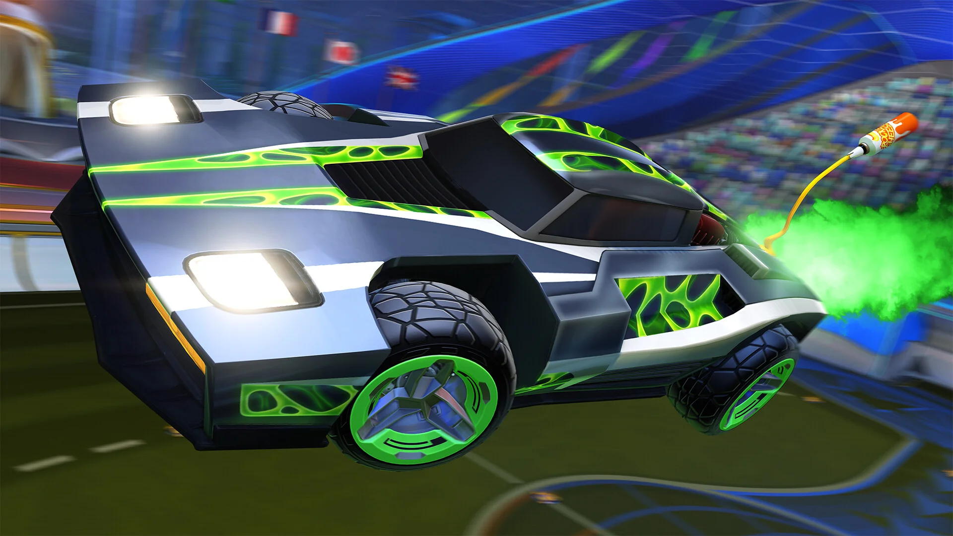 Gameplay screenshot of Rocket League showing rocket cars boosting to hit an oversized soccer ball in an enclosed stadium