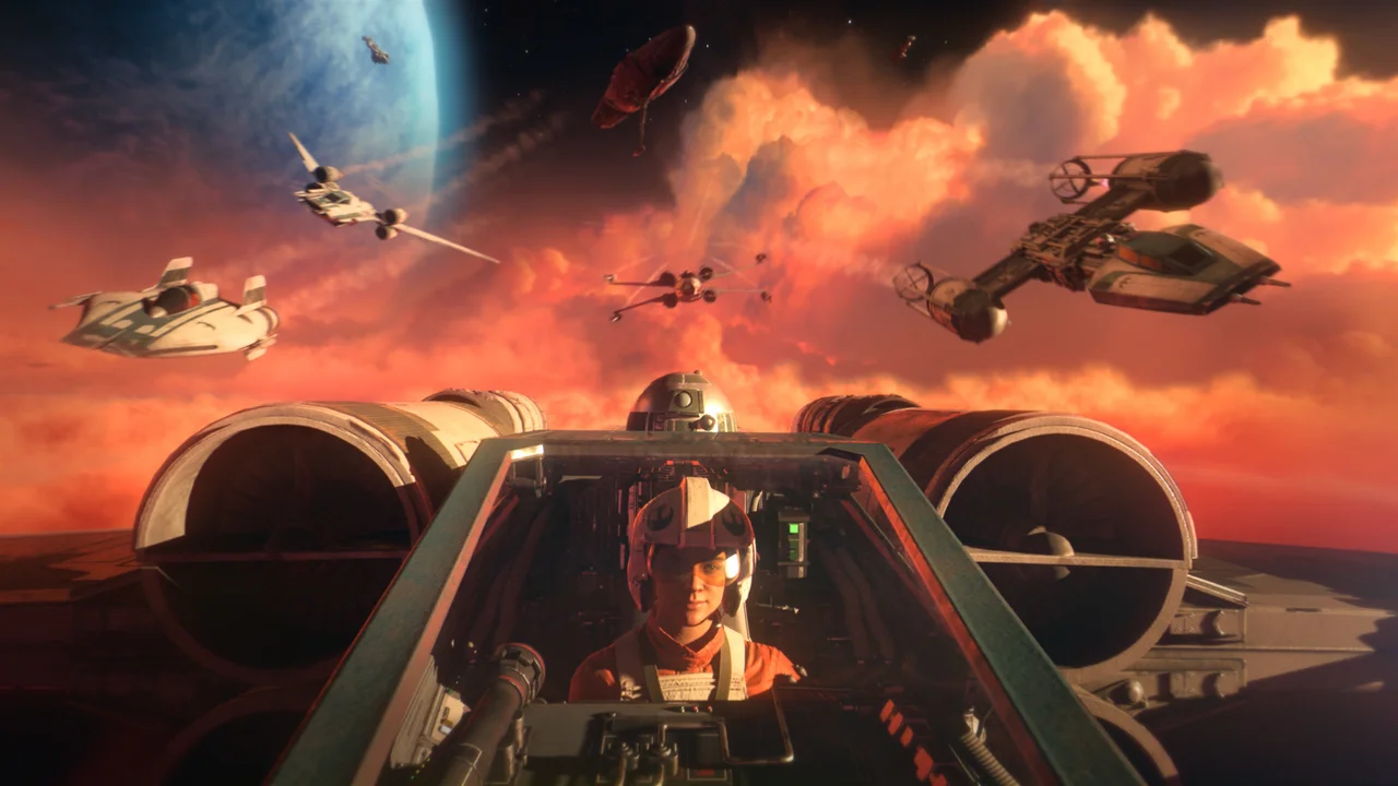 First-person X-wing cockpit view during a space dogfight against Imperial TIE fighters in Star Wars: Squadrons