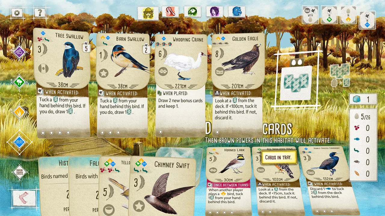 Gameplay screenshot of Wingspan showing the wildlife reserve player mat with played bird cards and egg slots
