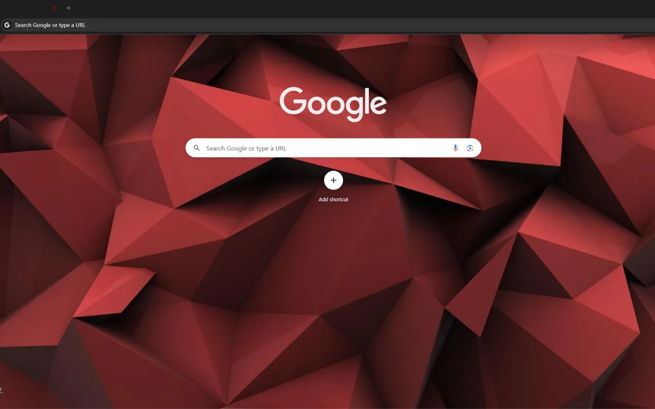 Red and Black Origami Chrome theme with red low-poly shapes