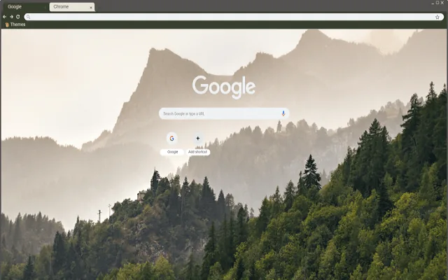 Misty mountains and trees in soft fog